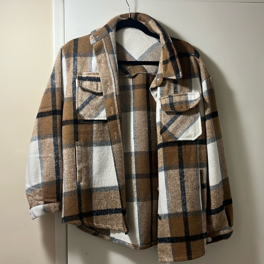 Brown and tan lumberjack style sweater
